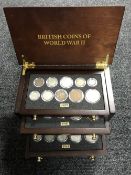 A mahogany and brass fully fitted coin cabinet of eight trays - British Coins of World War II,