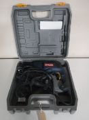 A cased Ryobi corded power drill
