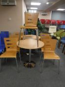 A pair of pine effect cafe tables and eight stacking Srovi cafe chairs on metal legs
