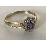 A 9ct gold dress ring set with an amethyst, size O.