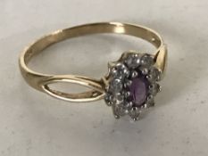 A 9ct gold dress ring set with an amethyst, size O.