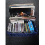 A crate of vinyl 7 inch and 12 inch singles and LP's - picture discs,