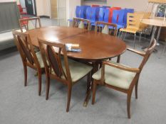 A mahogany G PLan extending table and six chairs