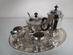 A four piece silver plated tea service on tray