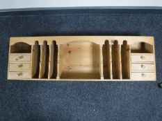 A pine correspondence rack fitted six drawers