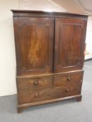 A Victorian mahogany press fitted three drawers