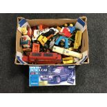 A box containing mid 20th century and later die cast vehicles including a boxed radio control BMW