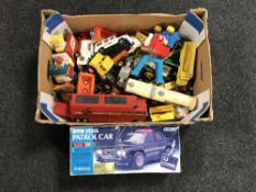 A box containing mid 20th century and later die cast vehicles including a boxed radio control BMW