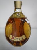 A bottle of Dimple whisky