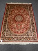 A Keshan rug 1.9m x 1.