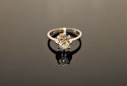 A white gold diamond solitaire ring, approximately 0.6ct, size N/O.