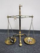 A set of vintage brass balance scales by Degrave of London with weights,