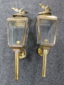 A pair of brass carriage lamps
