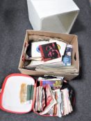 A box and vintage case containing assorted sheet music and 45's together with a wooden LP stand