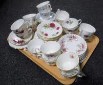 A tray containing part Royal Albert and Colclough tea services