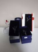 Four boxed Swarovski Crystal tulips and stand