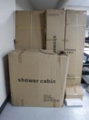 A boxed new shower cabinet,