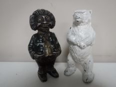 A cast metal figure of a bear together with a cast metal money box