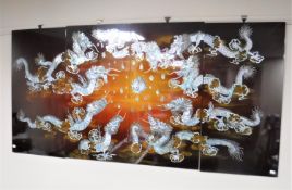 A set of four Oriental lacquered panels depicting dragons