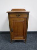 An Edwardian satin walnut bedside cabinet