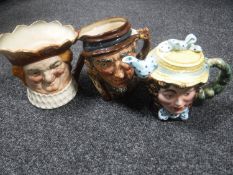 Two Royal Doulton character jugs - Old king Cole and Johnnie Appleseed together with a Beswick