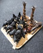 A tray containing pair of oak barley twist candlesticks, wooden elephant ornaments,