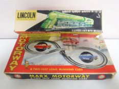 A boxed vintage Lincoln International Choo-Choo Loco together with a boxed vintage Marks Motorway