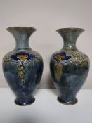 A pair of Royal Doulton Lambeth vases (restored)