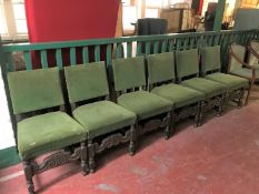 A set of six early twentieth century carved oak dining chairs,