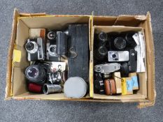 A box of quantity of assorted cameras,