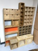 A pine glazed door wall cabinet and pine storage shelves