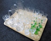 A tray of early 20th century etched glass ware, two-tone liqueur glasses,