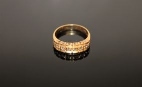 An 18ct gold six stone diamond ring, size P/Q, 4.5g.