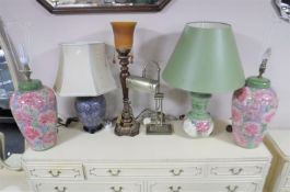 Four assorted table lamps together with an Art Deco style table lamp with glass shade and a metal
