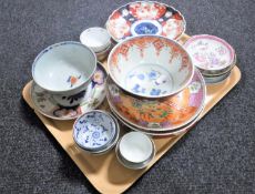 A tray containing 20th century oriental wall plates and finger bowls