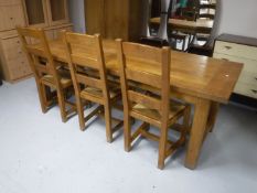 A Barker & Stonehouse farmhouse kitchen table and three ladder back chairs CONDITION