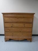 A late nineteenth century continental pine five drawer chest
