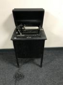 An early 20th century The Dictaphone Shaving Machine by The Columbia Gramophone Company in cabinet