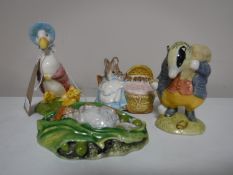 Four Royal Albert Beatrix Potter figures including Hunka Munka etc