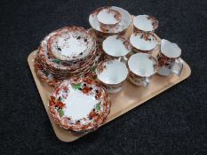 A twenty three piece antique china tea service