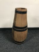 An oak coopered barrel in the form of a stick stand