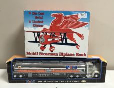 A Mobil Stearman Biplane Limited Edition Die Cast Novelty Coin Bank, in original packaging and box,