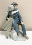 A Lladro figurine : The Kiss, model 4888, height 32 cm, boxed.