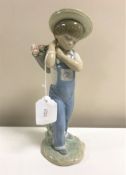 A Lladro figurine : Flower Harvest, model 1286, height 23 cm, boxed.