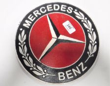 A cast iron Mercedes Benz plaque