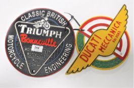 Two cast iron motor cycle plaques - Triumph Bonneville & Ducati