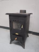 A Prity multi fuel stove