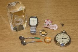 A 9ct gold band ring, a glass paperweight depicting a unicorn, two silver and enamel caddy spoons,