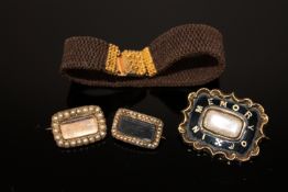 A group of early 19th century memoriam jewellery including a hair bracelet with high carat gold