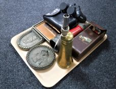 A tray of brass leather cased fire extinguisher, fire hose nozzle, two sets of binoculars,